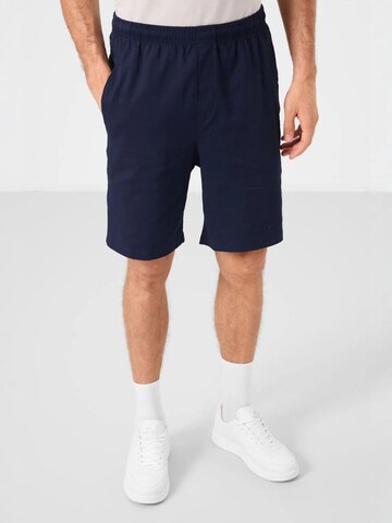 Tommy Life - Loosefit Calças em azul: frente