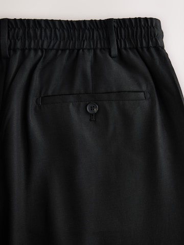 Loosefit Pantaloni con pieghe 'N. Premium' di Next in nero