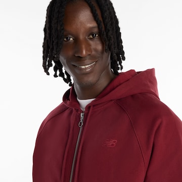 new balance - Sudadera con cremallera en rojo