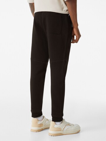 Bershka Tapered Broek in Zwart