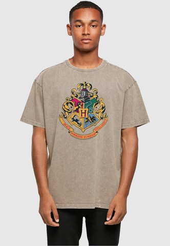 ABSOLUTE CULT Shirt 'Harry Potter - Hogwarts Crest Gold' in Bruin: voorkant