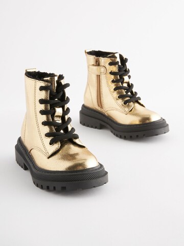 Next Stiefel in Gold