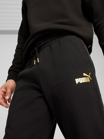 PUMA Tapered Sports trousers 'ESS' in Black