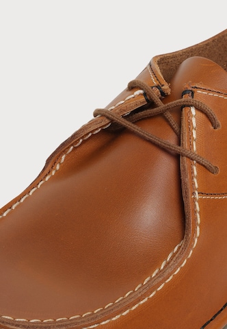 BIRKENSTOCK Мокасины 'Utti' в Коричневый