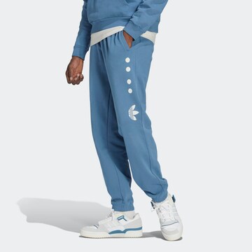ADIDAS ORIGINALS Tapered Pants 'Reclaim Logo' in Blue: front