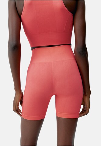 Skinny Pantalon de sport 'Urdhva' Born Living Yoga en rose