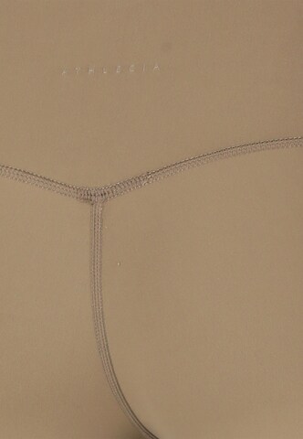 Athlecia Skinny Sports trousers 'Emarri' in Brown