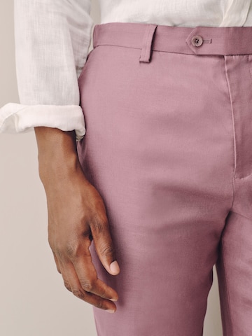 Slimfit Pantaloni con piega frontale di Next in rosa