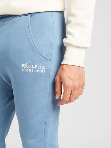 mėlyna ALPHA INDUSTRIES Siaurėjantis Kelnės