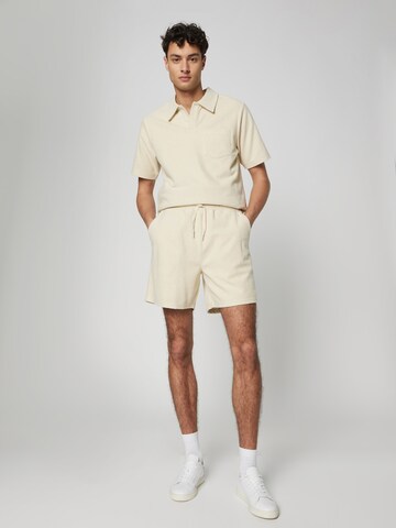 ABOUT YOU x Jaime Lorente Regular Shorts 'Leon' in Beige