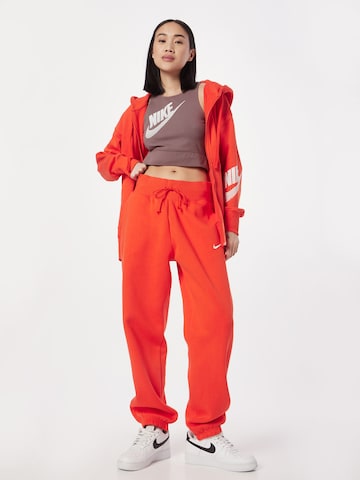 Nike SportswearTapered Hlače 'Phoenix Fleece' - crvena boja