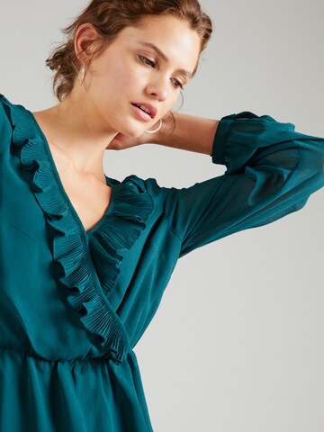 ABOUT YOU Blouse 'Cassia' in Green