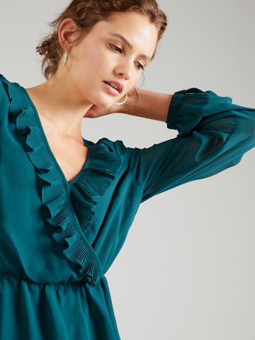 ABOUT YOU Blouse 'Cassia' in Green