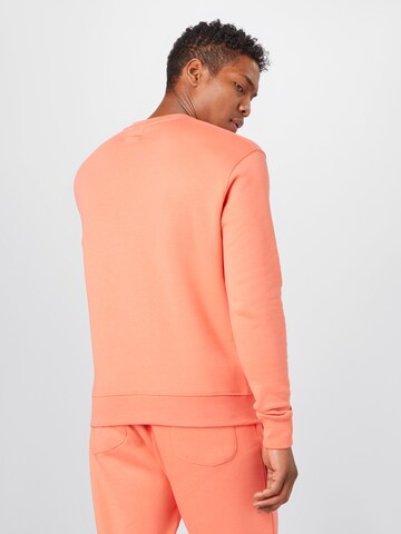 ABOUT YOU x Mero Sweatshirt 'Kelkid' in Orange