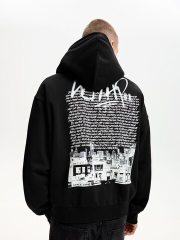 Sweat-shirt Bershka en noir : devant