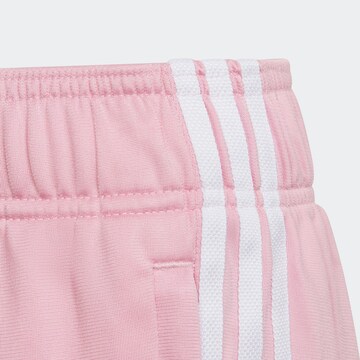 Tapered Pantaloni di ADIDAS ORIGINALS in rosa