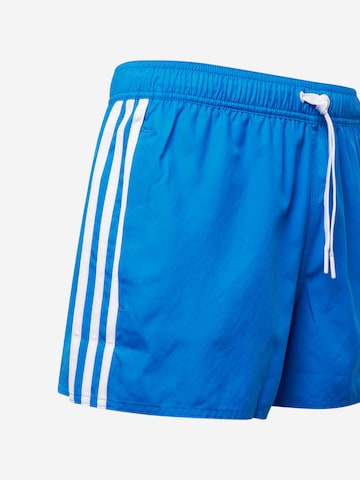 ADIDAS SPORTSWEAR - Calções de banho desportivos em azul