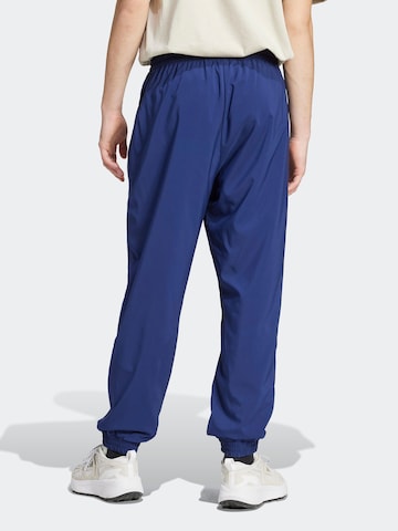ADIDAS SPORTSWEAR Tapered Sportbroek 'Essentials' in Blauw