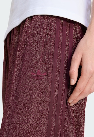 ADIDAS ORIGINALS Wide leg Trousers in Red