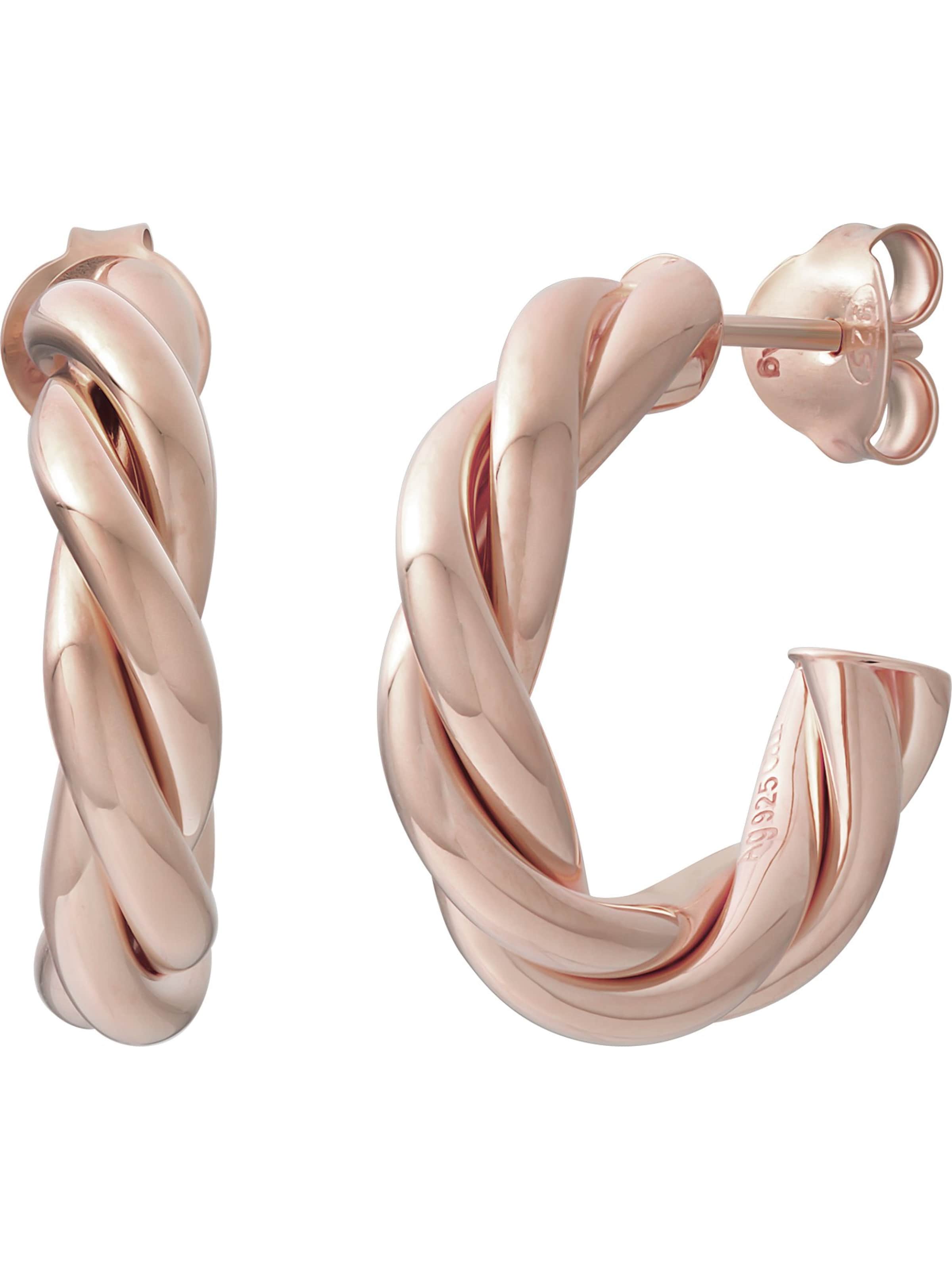 Boucles d'oreilles caï en or : devant