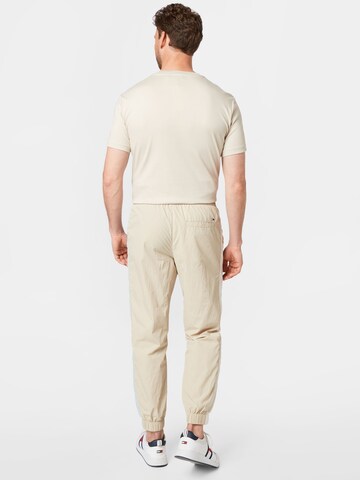 Tommy Jeans Tapered Hose in Beige