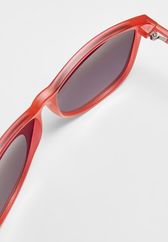 Lunettes de soleil Urban Classics en rouge