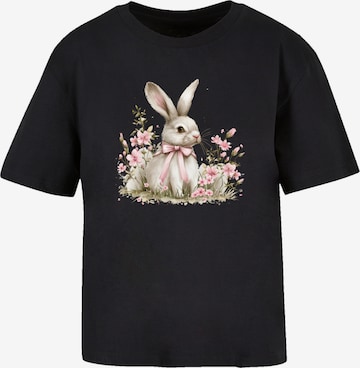 F4NT4STIC Shirt 'Niedlicher Osterhase mit Blumen' in Zwart: voorkant