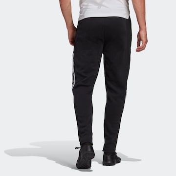 ADIDAS SPORTSWEAR Zwężany krój Spodnie sportowe 'Tiro 21 Sweat' w kolorze czarny