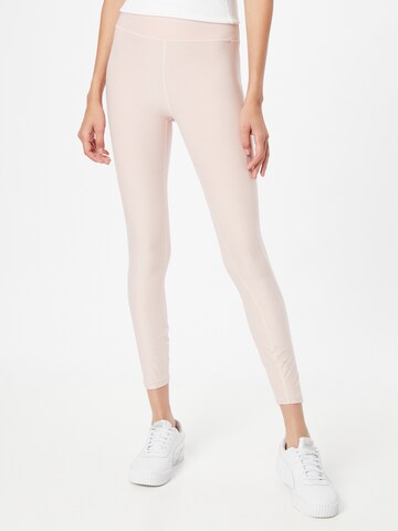 PUMA Skinny Workout Pants in Pink: front