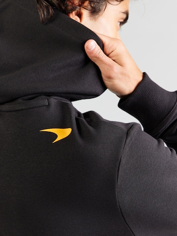 PUMASweater majica 'McLaren ESS' - crna boja