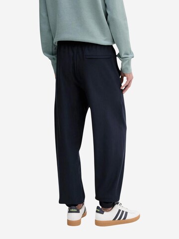 Calvin Klein Jeans Regular Sportbroek 'PREMIUM TERRY MONOGR LV04RC279G' in Blauw