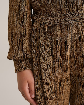 Salopetă de la WE Fashion pe auriu