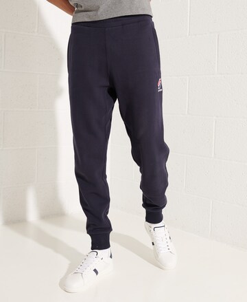 Superdry Tapered Pants in Blue: front