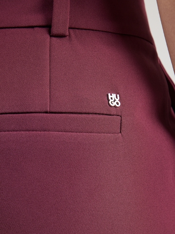 Slimfit Pantaloni cu dungă 'Hedima-1' de la HUGO pe roșu