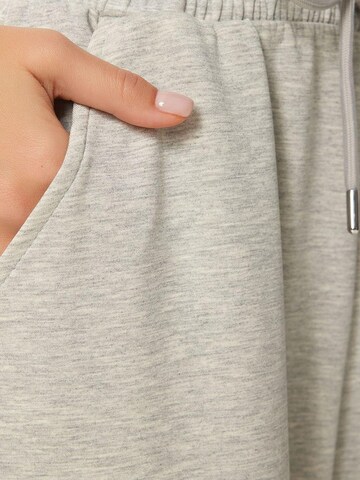 Wide leg Pantaloni di Happiness İstanbul in grigio