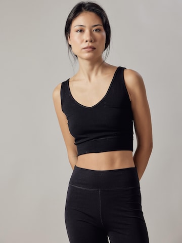 Top di OWN Off With Nature in nero: frontale