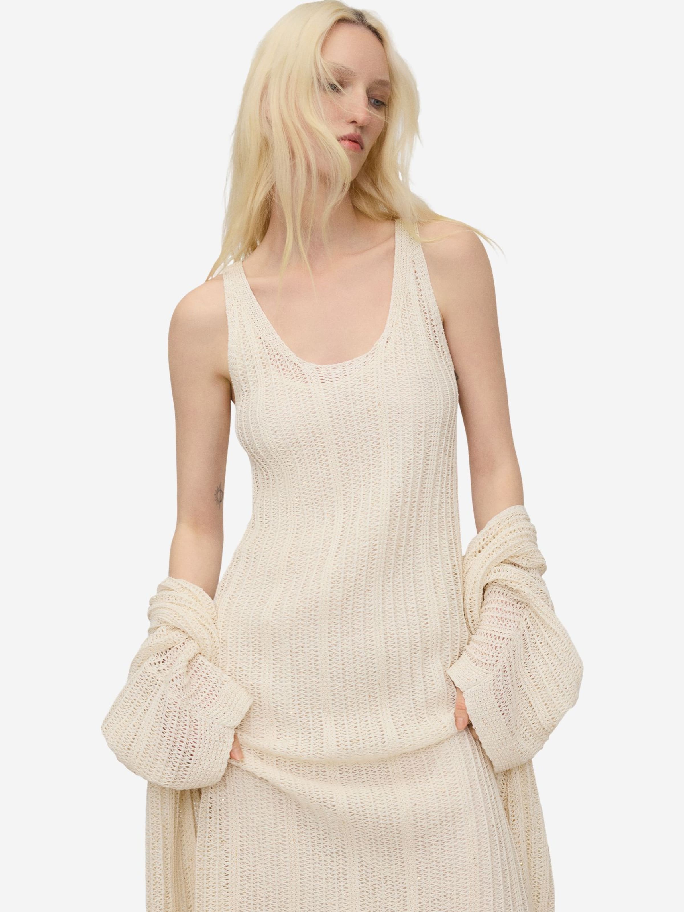 Adolfo Dominguez Mekko värissä beige