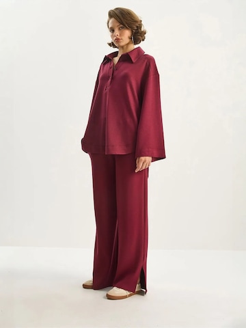 Completo pantalone di Bianco Lucci in rosso