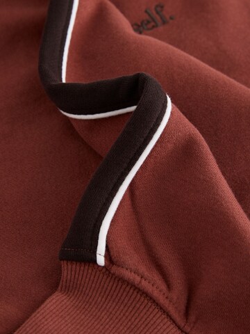 Sweat-shirt self. en marron