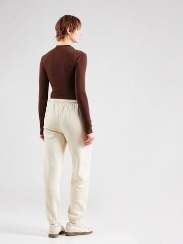 ELLESSE Конический (Tapered) Штаны 'Arabica' в Белый