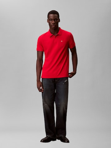Tricou de la Calvin Klein Jeans pe roșu