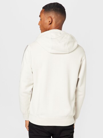 Nike Sportswear - Sweatshirt 'Repeat' em bege