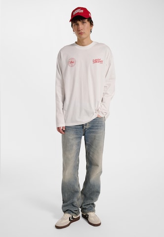 T-Shirt fonctionnel Hummel en blanc