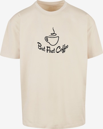 Merchcode Shirt 'But First Coffee' in Beige: voorkant