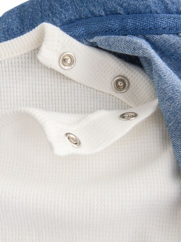 Set Next en bleu