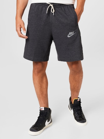 Nike Sportswear Szabványos Nadrág 'REVIVAL' - fekete: elől