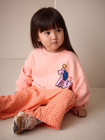 Next - Conjuntos em laranja