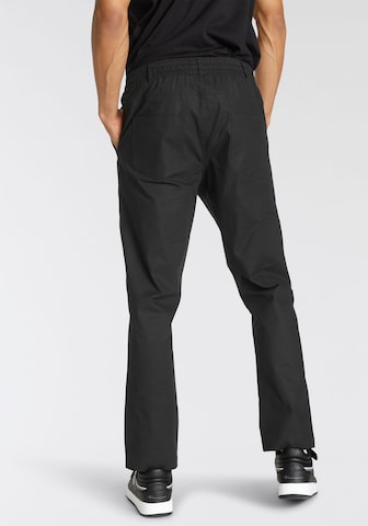 Champion Authentic Athletic Apparel Regular Workout Pants in Black