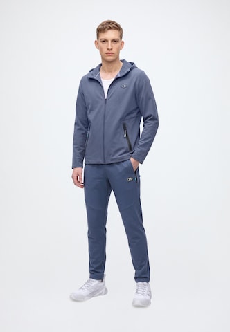 UNDER ARMOUR - Tapered Pantalón deportivo 'Utility' en gris