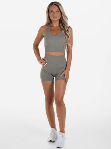 Divina Skinny Urheiluhousut 'Conscious' värissä harmaa